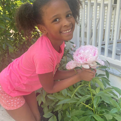 Fallon helped me pick more flowers from the garden today!