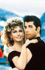 Watching the movie GREASE